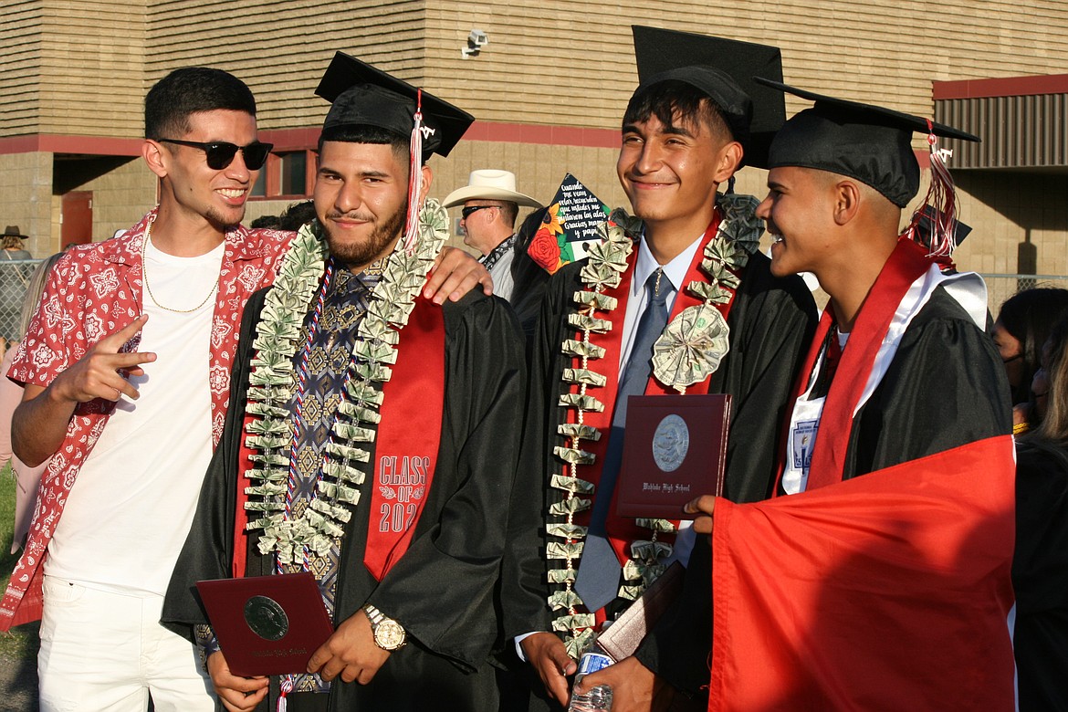 Wahluke High School graduates pose for a post-ceremony picture in Mattawa Friday.