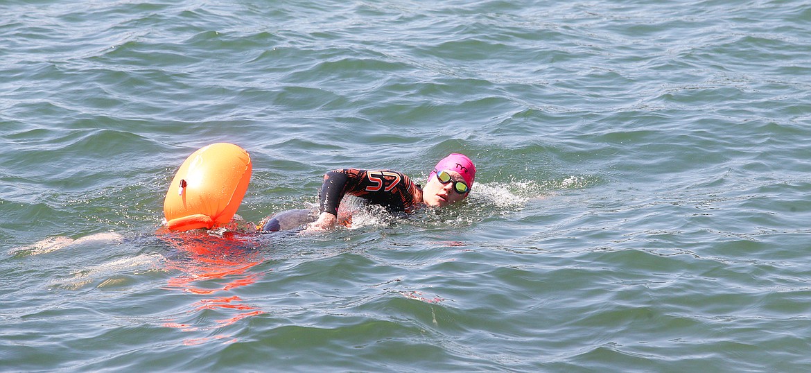 Megan Ivers swims in Lake Coeur d'Alene just off Independence Point on Tuesday in preparation for Sunday's Ironman Coeur d'Alene.