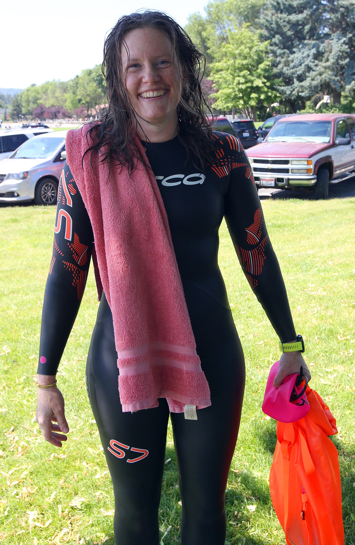Megan Ivers relaxes after swimming in Lake Coeur d'Alene Tuesday as she tunes up for Sunday's Ironman Coeur d'Alene.