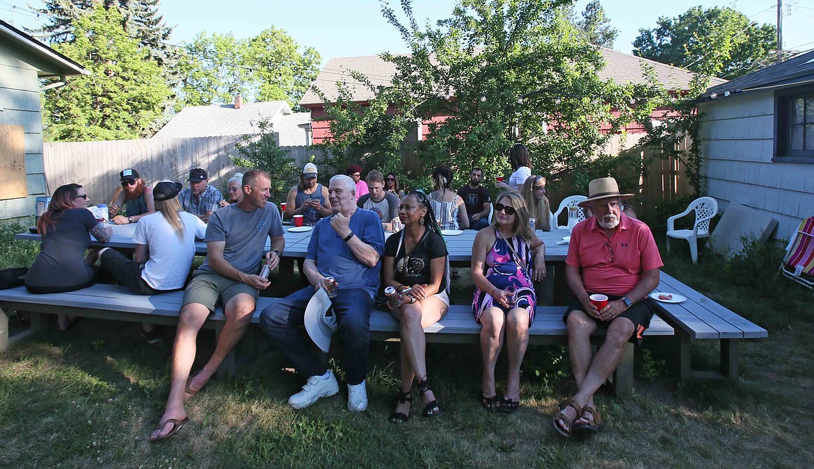 One and all are welcome to attend the Monday Night Dinners at Adam Schluter's house in Coeur d'Alene. Every other Monday, Schluter opens his back yard for a community gathering where people can meet their neighbors and make new friends.