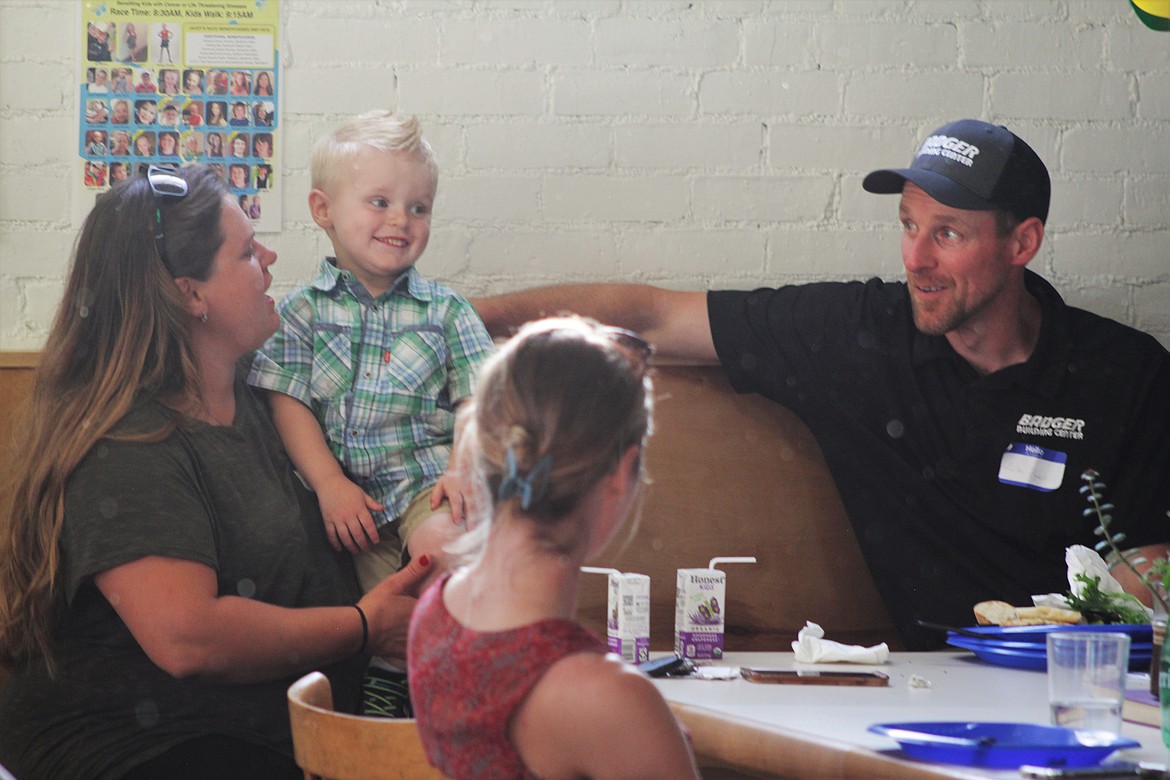 Colton and his parents were honored at the Beneficiary dinner Wednesday night at the Longshot.