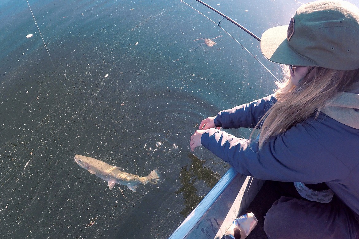 Madison Nackos releases a 24-inch Westslope Cutthroat Trout back into the cool waters of Priest Lake, clinching the current catch-and-release Idaho state record for this species.