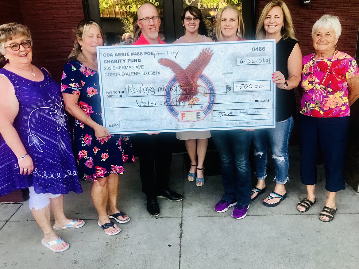 The Coeur d'Alene Eagles Auxiliary No. 486 presented Newby-ginnings a check in the amount of $500 to use for veterans in need. Pictured from left: Cathy Hudson, auxiliary conductor; Laura LaChapelle, auxiliary vice president; Joe Stordahl, Newby-ginnings board president; Amy Sweet, auxiliary trustee; Brandi Stordahl, Newby-ginnings volunteer coordinator; Barb Smalley, auxiliary president; and Julie Robinson, auxiliary chaplain.