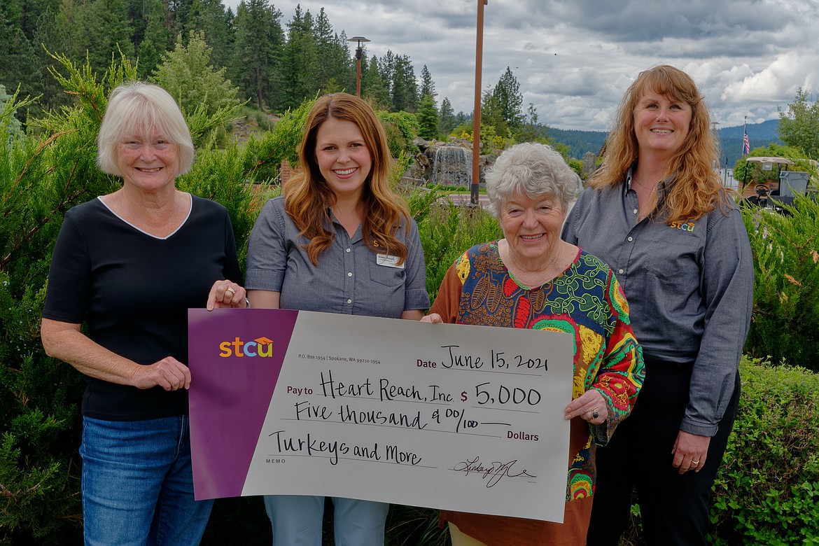 STCU contributes $5,000 for Turkeys & More

For the second year in a row, STCU has given a big boost to the Turkeys & More fundraiser to buy turkeys for vulnerable families in Kootenai County. Their $5,000 recent check will assist in serving 1,800 families or 7,000 people for Thanksgiving. Coordinator Evalyn Adams said this wonderful donation will bring the total to almost half of the $51,000 needed for the November distribution. Adams hoped others would contribute by sending a check made out to: Heart Reach Inc., the nonprofit sponsor. Mail to Director Myndi Sizemore, % Heart of the City Church, 722 W. Kathleen Ave., Coeur d'Alene, ID 83815. Put Turkeys & More on the line describing reason for donation. Pictured from left: Barbara Fillmore, treasurer of Turkeys & More; Kristin Piscopo, STCU community relations manager; Adams; and Kelly Conrey, STCU branch manager.