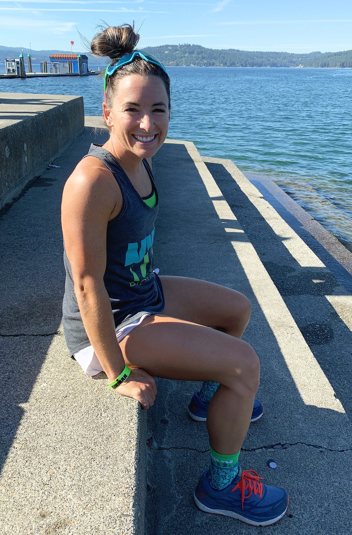 Laura Marcoux of Colorado sits at Independence Point on Friday. She is entered in today's Ironman CDA.