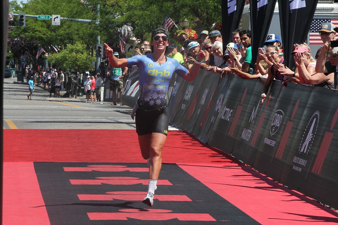 JASON ELLIOTT/Press
Fenella Langridge of Southampton, England, finishes second among women professionals at Sunday's Ironman Coeur d'Alene. Temperatures reached 101 degrees on Sunday afternoon for the race, which consisted of a 2.4-mile swim, a 112-mile bike leg and a 26.2-mile run.