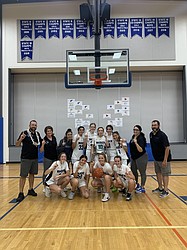 Warden High School girls basketball coaches and players pose together for a photo Friday night after winning the 2B/1B Invitational State Tournament at Mount Vernon Christian High School.