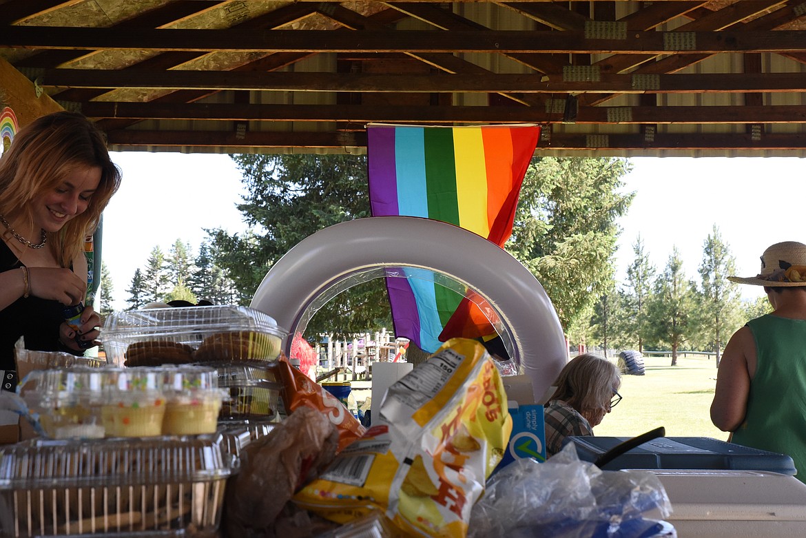 Attendees picked from a smorgasbord of food and treats during last weekend's Pride month potluck in Libby. (Derrick Perkins/The Western News)