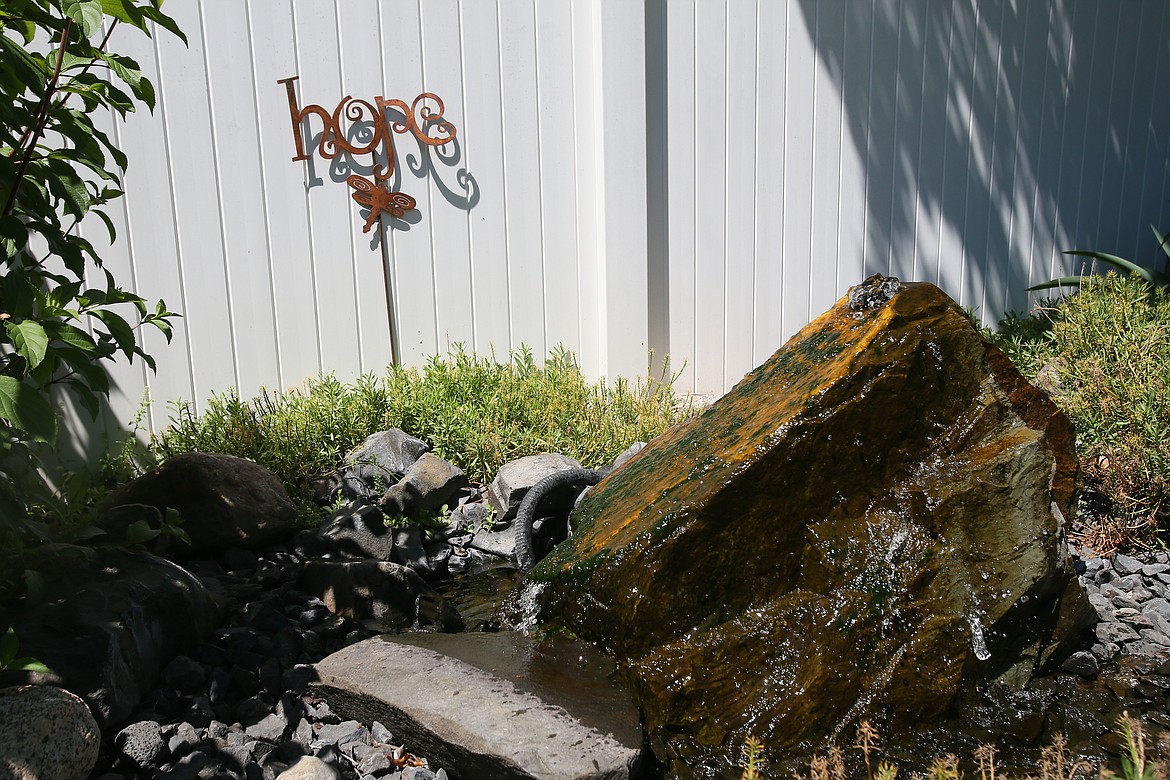 A refreshing rock water feature cools the atmosphere and gives visiting critters a place to hydrate in Susan Lovelace's garden. The Coeur d'Alene Garden Club will present its 23rd annual Garden Tour at several Hayden and Coeur d'Alene gardens July 11.