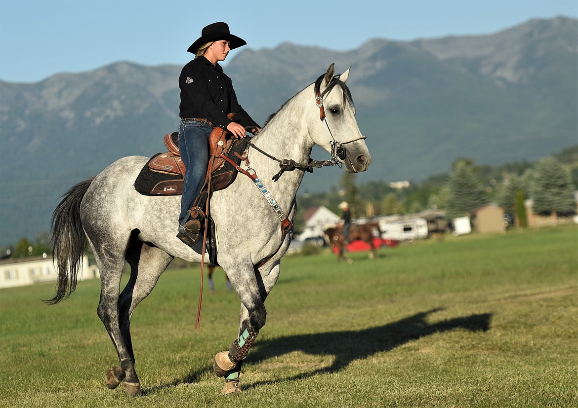 Bonner barrel racer Alexis Rose warms up her ride prior to Saturday's competition. (Scot Heisel/Lake County Leader)