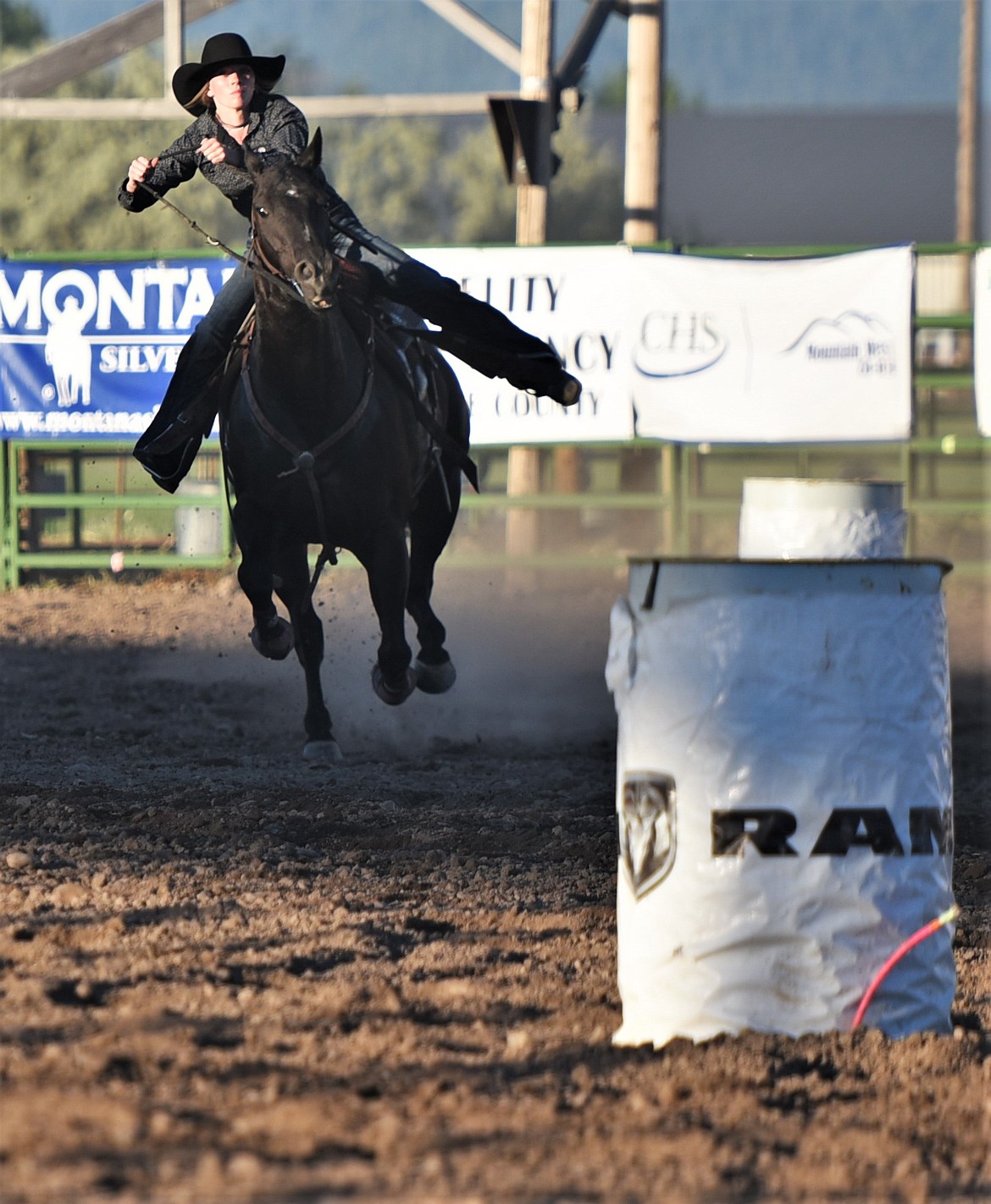 Darby Lytle of Polson takes her turn at the barrel racing course Saturday. (Scot Heisel/Lake County Leader)