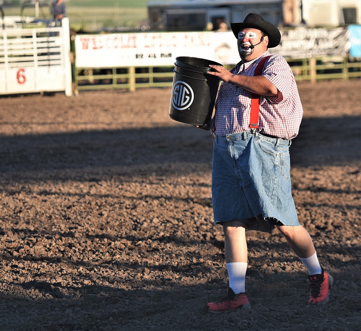 Clown/barrel man Jon Blixt entertains the crowd during a break in the action at the 2021 Mission Mountain Rodeo in Polson. (Scot Heisel/Lake County Leader)