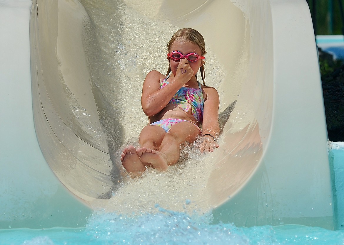 Cassidy Freyholtz, 7, exits a water slide at Woodland Water Park in Kalispell on Tuesday, June 29, 2021. (Matt Baldwin/Daily Inter Lake)