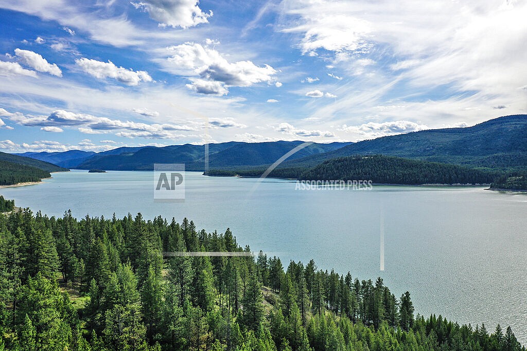 Lake Koocanusa is seen on June 16, 2021, northeast of Libby, Mont. Rising levels of the mining byproduct selenium is harming water quality, fish and other aquatic life in the lake along the US-Canada border. (Hunter D'Antuono/Flathead Beacon via AP)