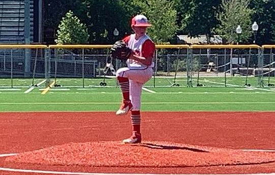 Landon Day prepares to throw a pitch in a tune-up game against Libby last weekend.