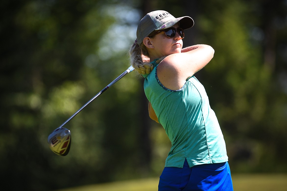 Lauren Nielson watches her drive off the 16th tee of the North Course during the opening round of the Earl Hunt 4th of July Tournament at Whitefish Lake Golf Club on Thursday, July 1. (Casey Kreider/Daily Inter Lake)