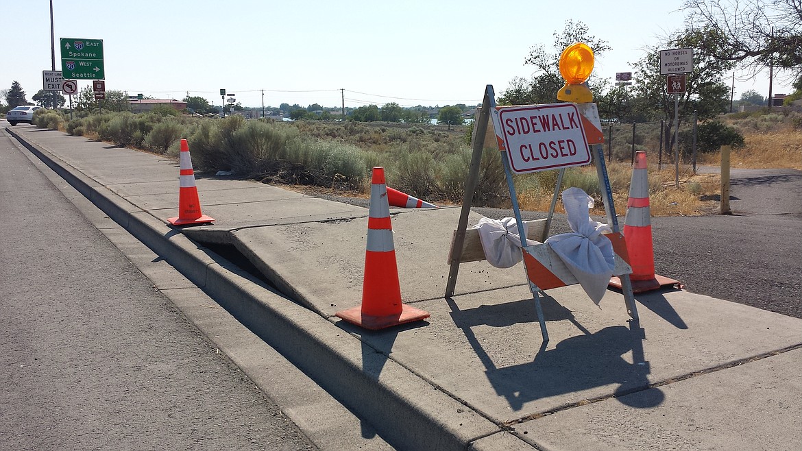 Sidewalks along West Broadway Avenue in Moses Lake buckled and rose, a phenomenon apparently caused by expansion under the searing heat of the past few days.