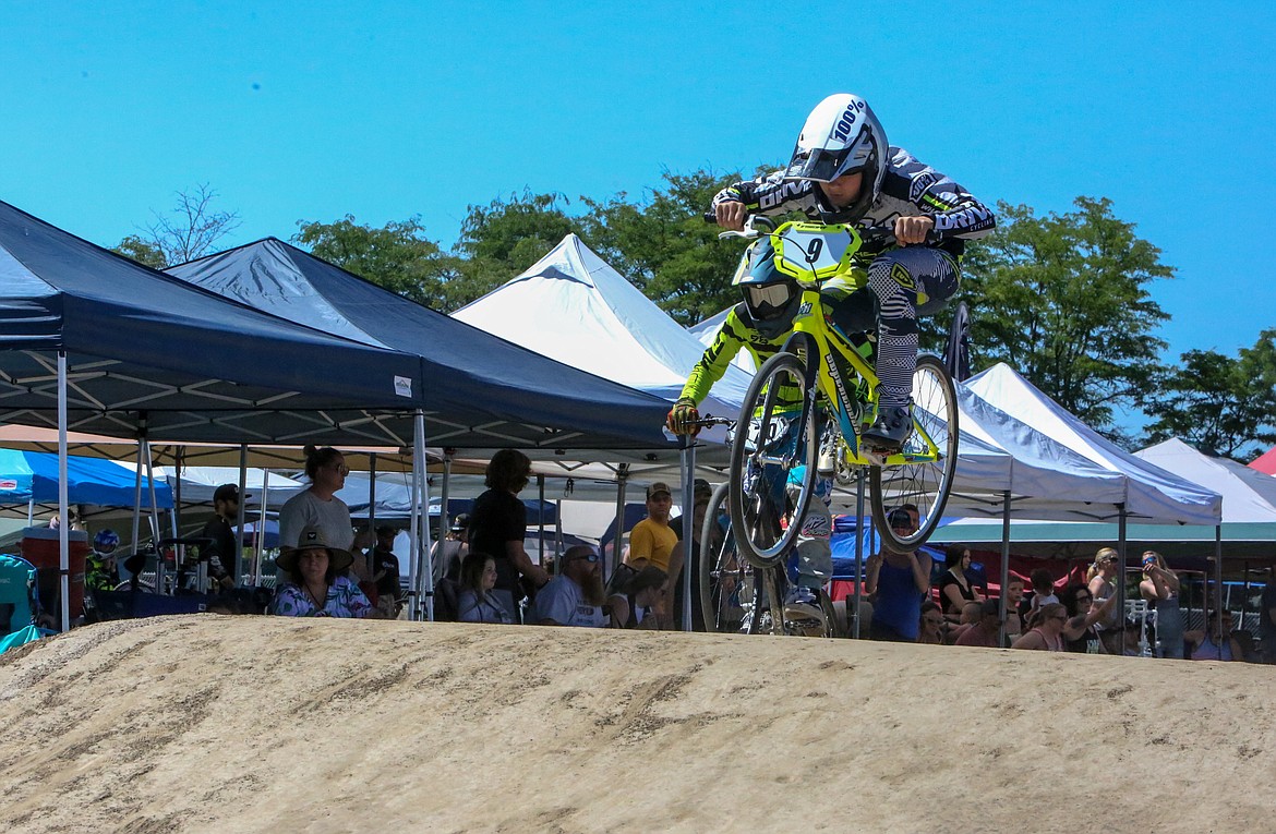 Ezekiel Green, front, followed closely by local rider Carter Ball, gets some air under his wheels at the Triple-Point Gold Cup regional qualifying event June 26.