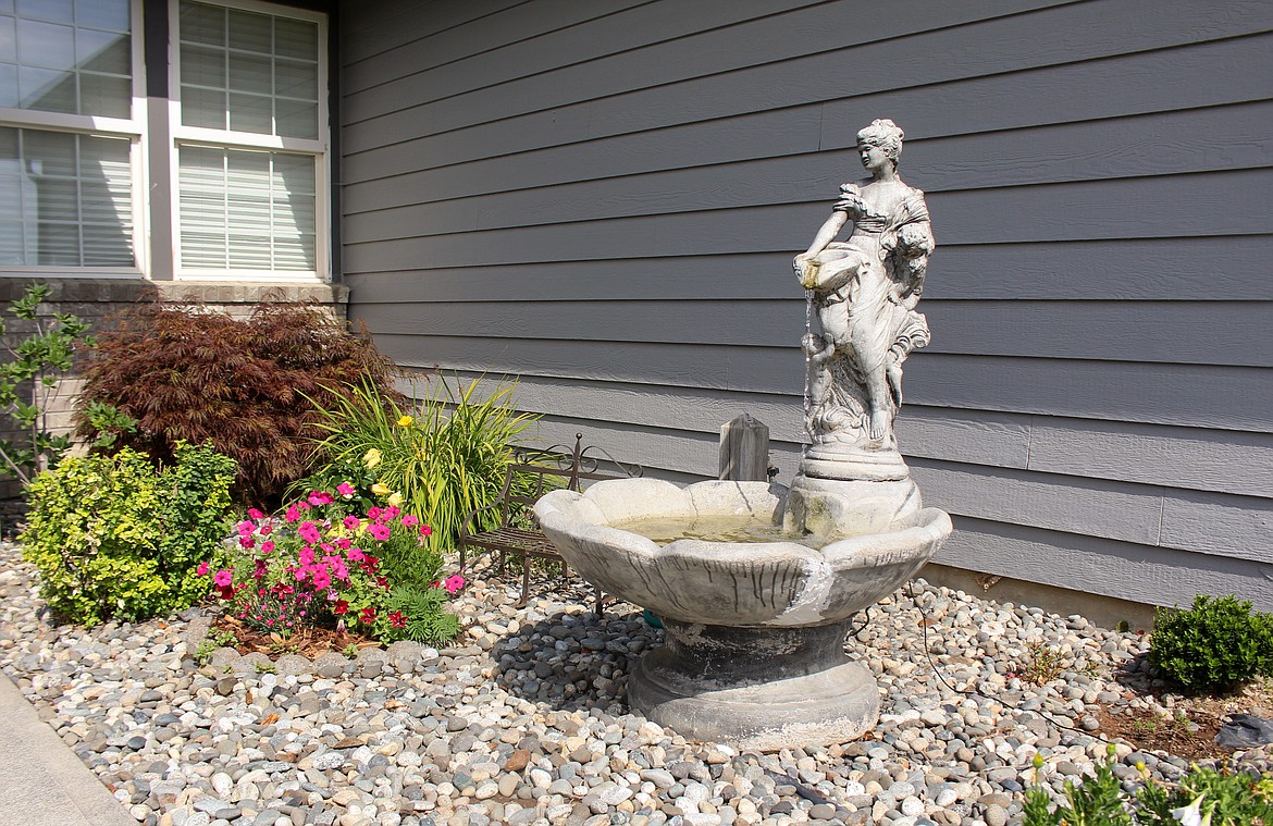 The concrete fountain in Bobbie Bodenman’s front yard in Moses Lake is originally from Italy and was left by the previous homeowners.