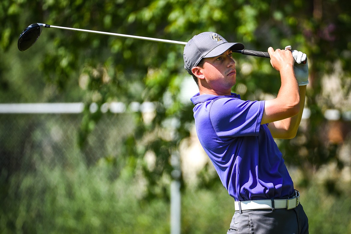 Riley Lawrence watches his drive off the third tee of the North Course during the second round of the Earl Hunt 4th of July Tournament at Whitefish Lake Golf Club on Friday, July 2. (Casey Kreider/Daily Inter Lake)
