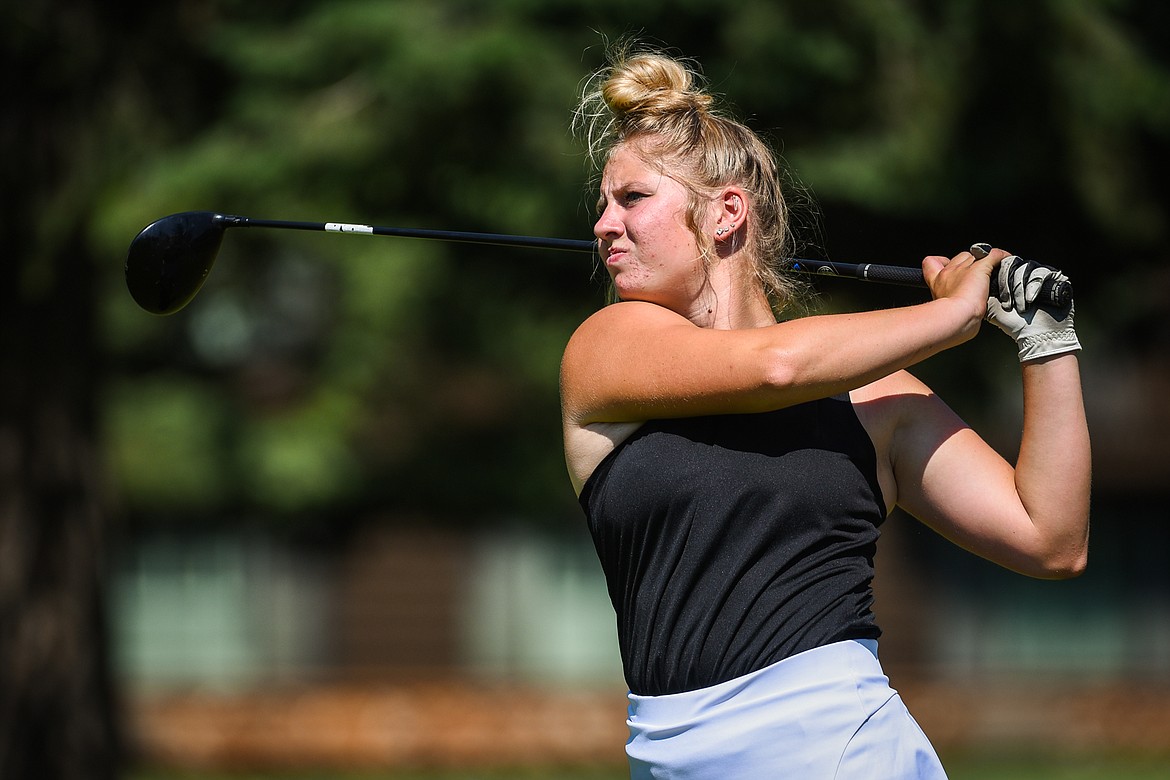 Isabella Johnson watches her drive off the first tee of the South Course during the second round of the Earl Hunt 4th of July Tournament at Whitefish Lake Golf Club on Friday, July 2. (Casey Kreider/Daily Inter Lake)