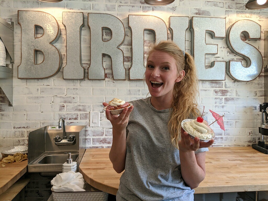 Courtesy photo
Aubrie Garza holds a marionberry cream and pina colada pie at Birdie's Pie Shop in Hayden.