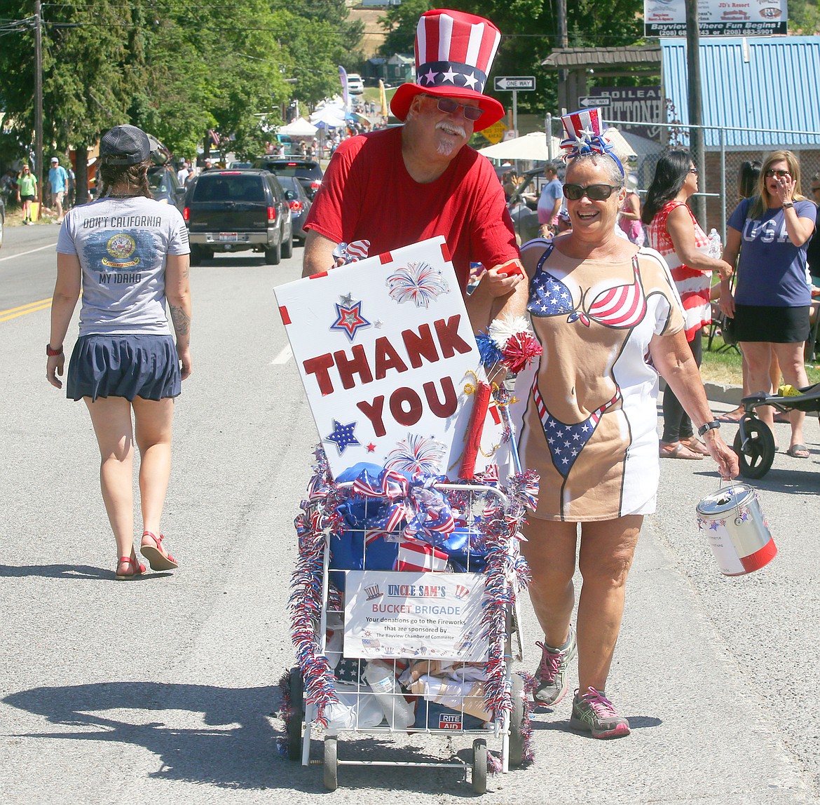Jamie Berube and Bob Prince were “Uncle Sam’s Bucket Brigade” on Saturday at the Bayview Daze parade.
