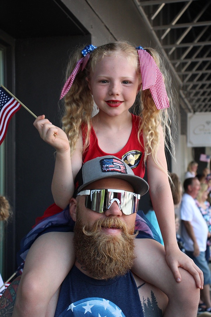Will Bozeman and Hattie (6) have been attending the Fourth of July parade every year since moving to Coeur d'Alene in 2015. HANNAH NEFF/Press