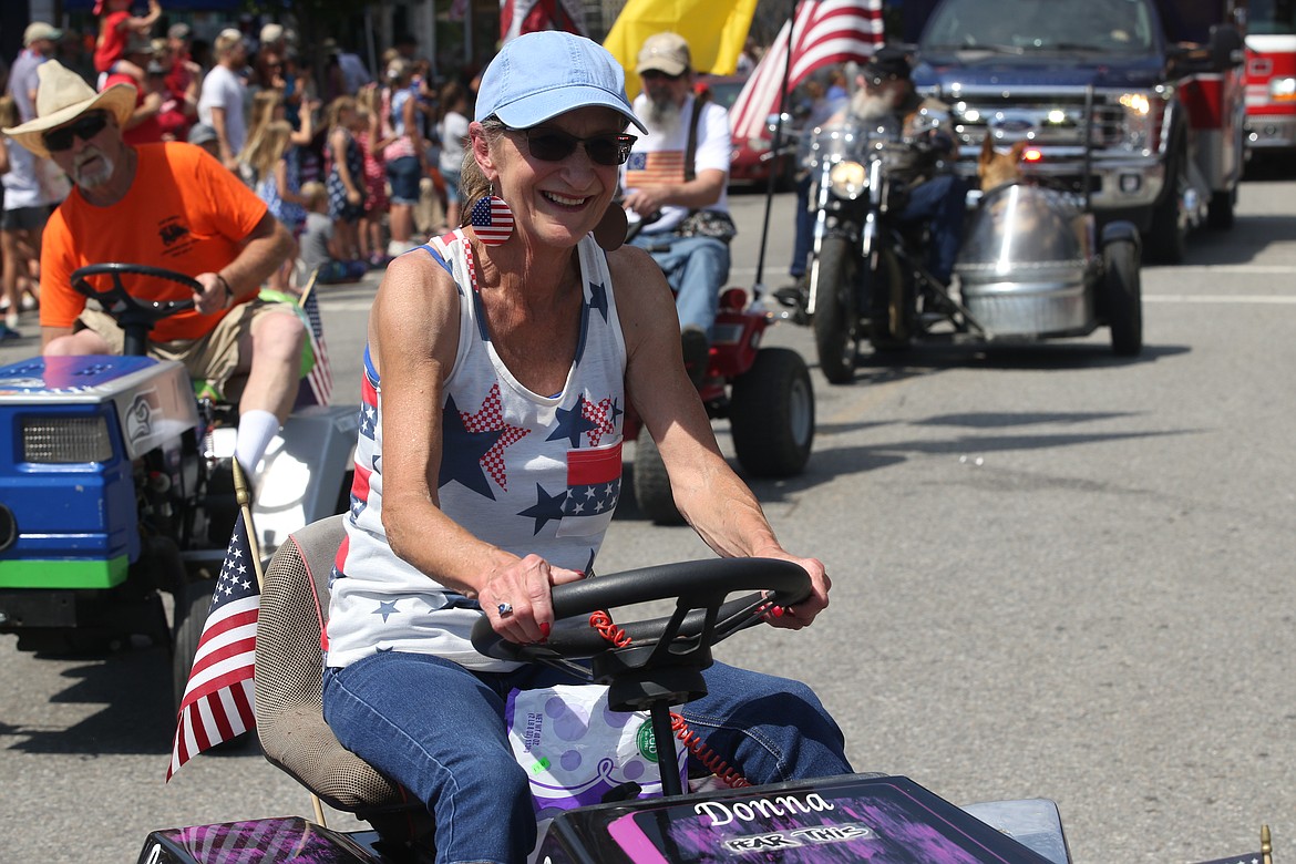 Donna Davis has fun in the Spirit Lake Fourth of July parade on Sunday.