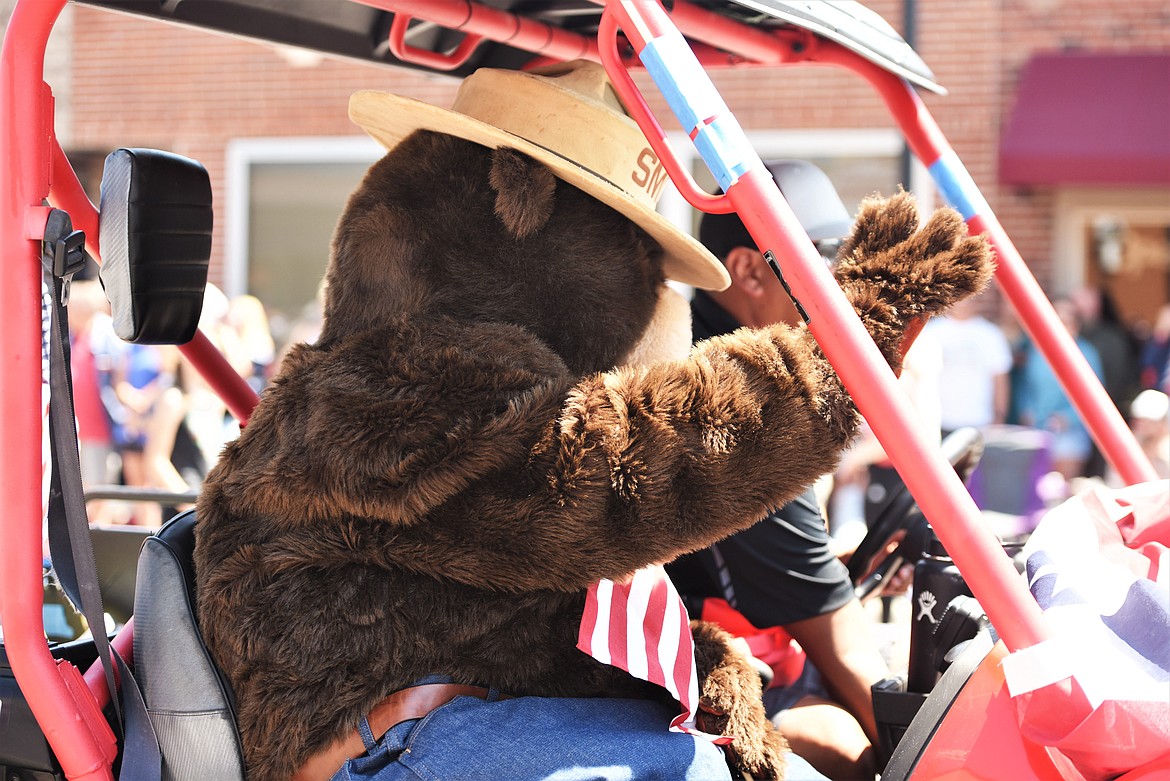 Smokey Bear waves to the crowd. (Scot Heisel/Lake County Leader)