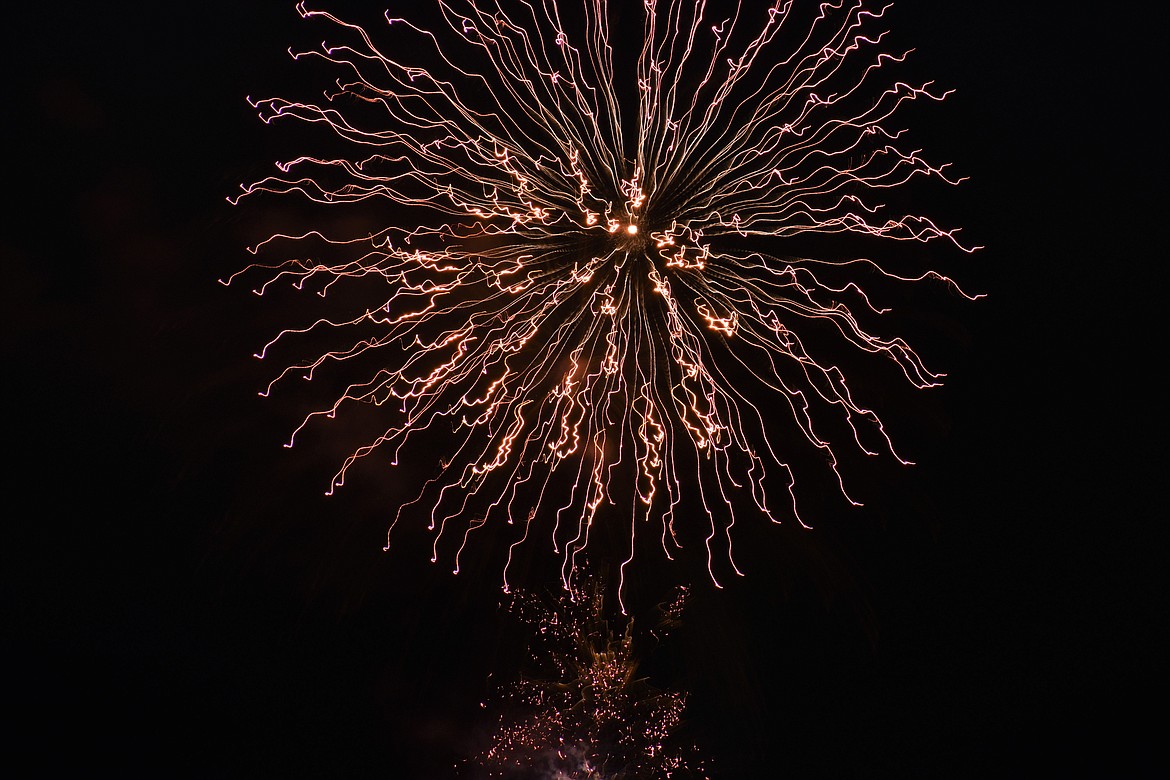 Scenes from the fireworks show at City Beach on Sunday.