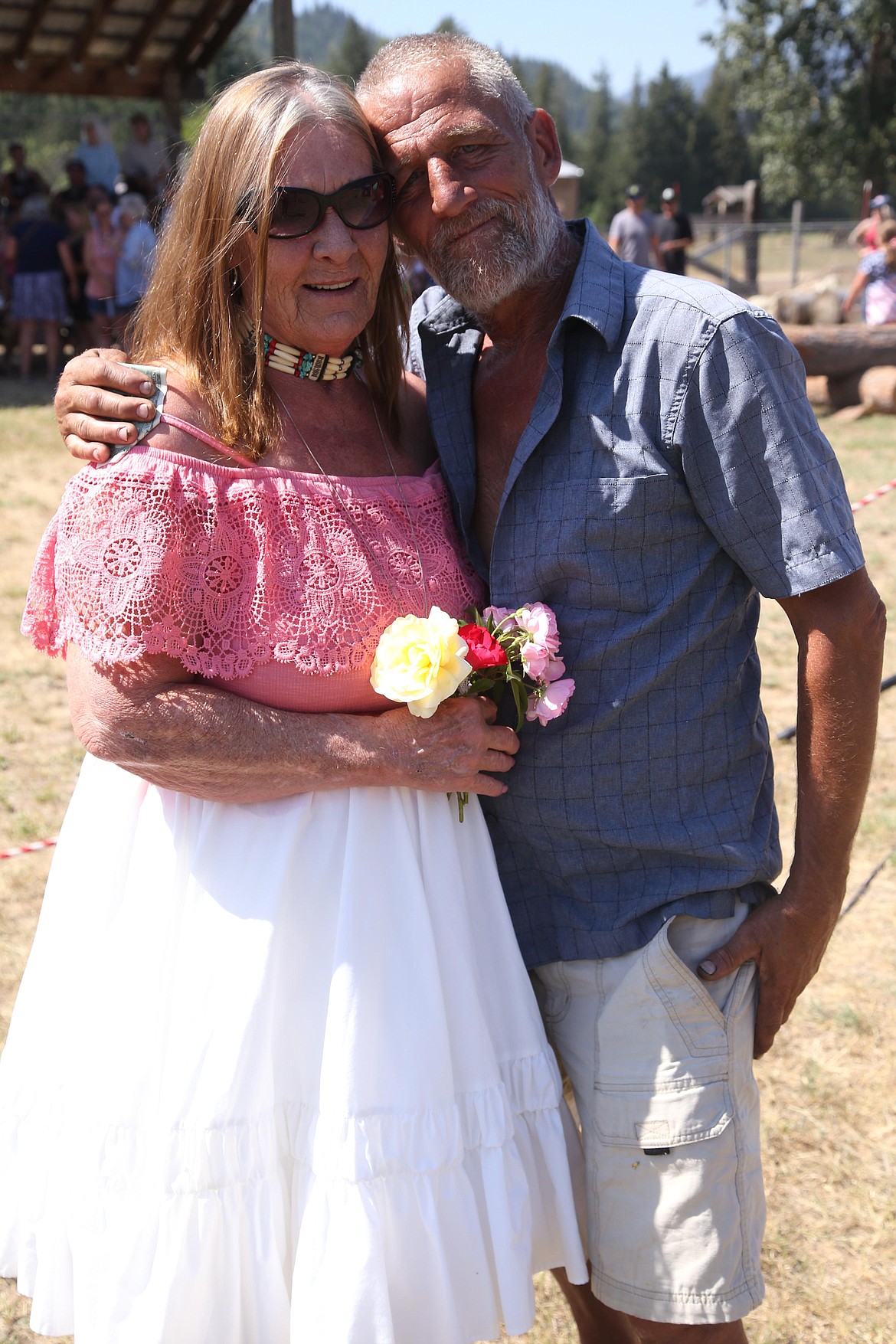 Scott and Clara Dunham got married after the turtle racing competition at the Old Fashioned Fourth of July celebration in Clark Fork on Sunday in front of the fully packed bleachers at the ballfield.