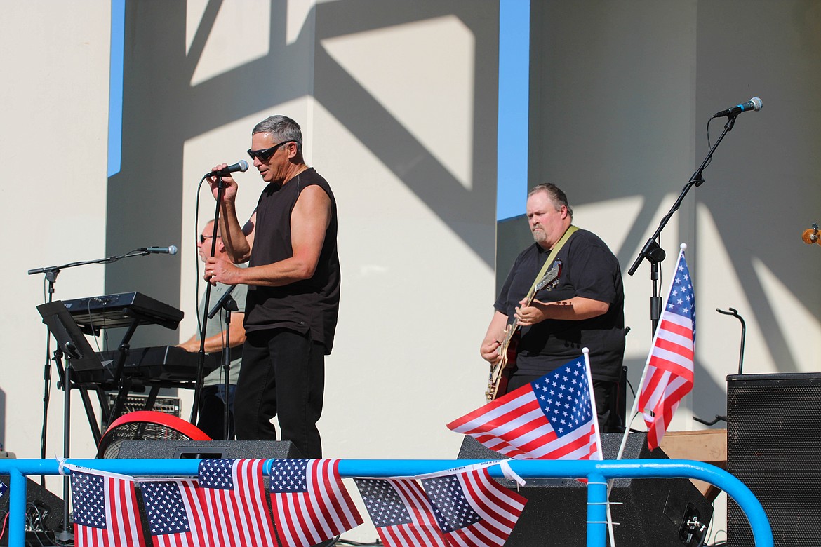 Rick Serra (left) and Justin Warren of Lake City Blues play at the Moses Lake Freedom Fest on Sunday.