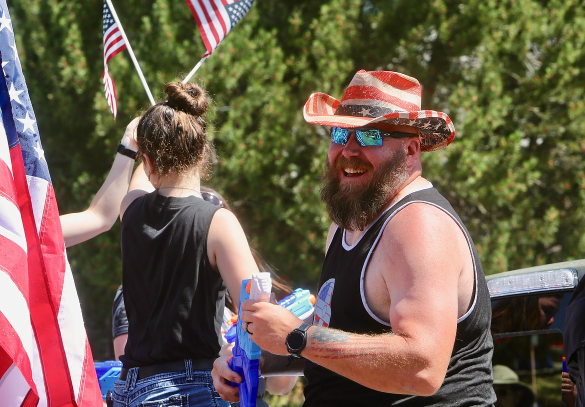 A man rocks a red, white and blue cowboy hat aboard a float during the Bigfork Fourth of July Parade.
Mackenzie Reiss/Bigfork Eagle