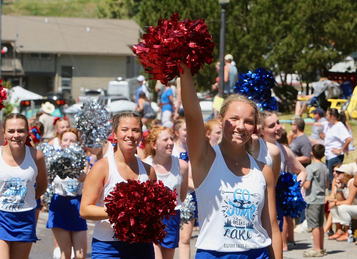 Cheerleaders wave to the crowd after wrapping up a routine during the Bigfork Fourth of July Parade.
Mackenzie Reiss/Bigfork Eagle