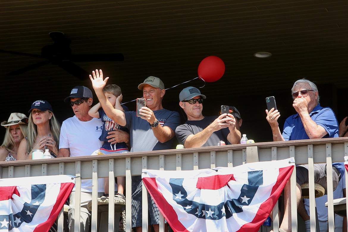 Onlookers capture the action during the Bigfork Fourth of July Parade.
Mackenzie Reiss/Bigfork Eagle