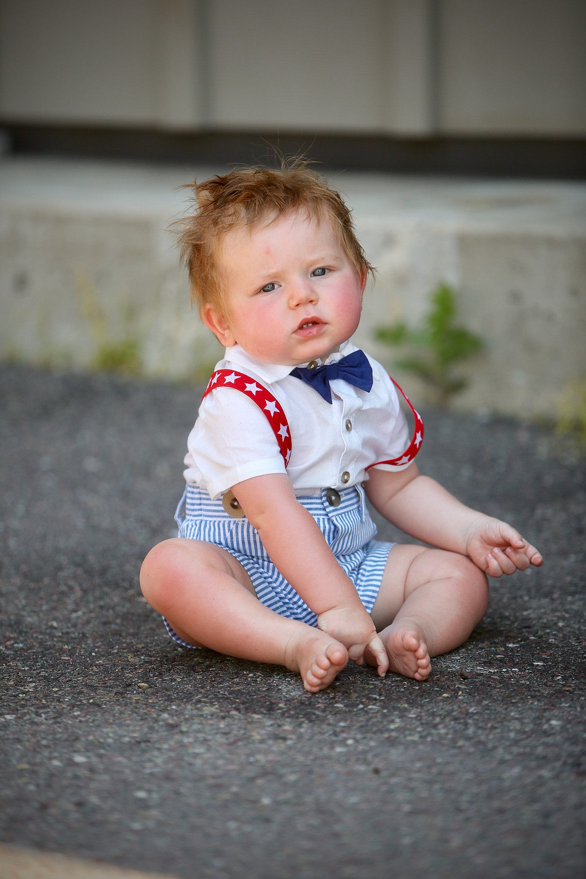 Eleven-month-old Theodore Nelson, of Bigfork, takes a break in the shade during the Bigfork Fourth of July Parade.
Mackenzie Reiss/Bigfork Eagle
