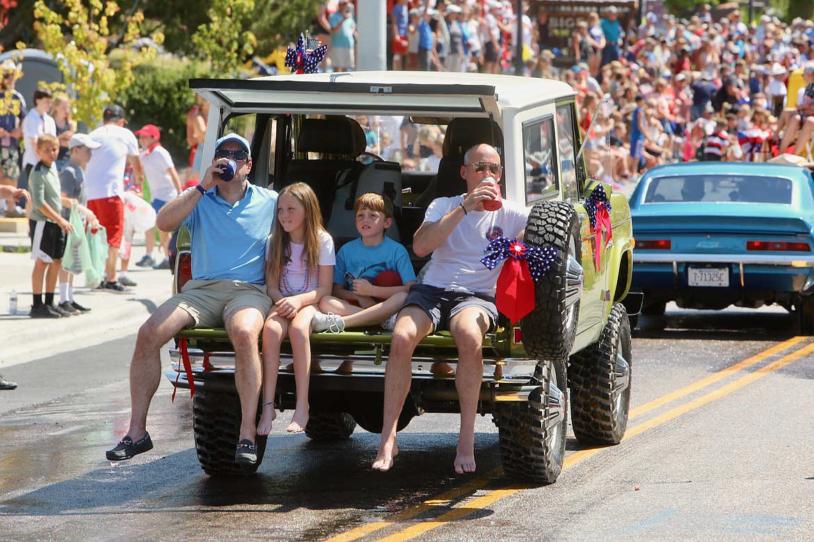 Parade participants keep cool as they cruise down Grand Drive.
Mackenzie Reiss/Bigfork Eagle