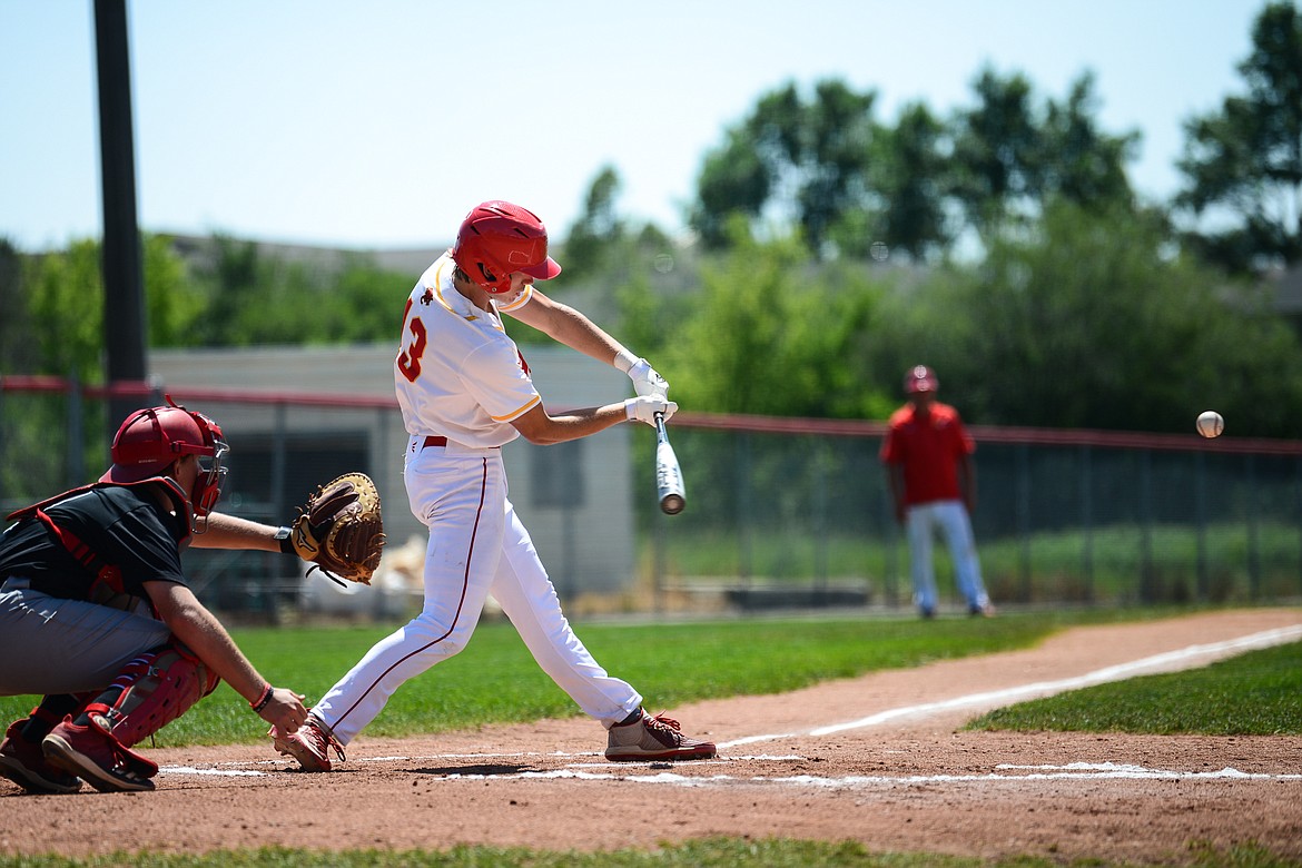 Kalispell Lakers AA's Ethan Diede (13) connects on a single against the Bozeman Bucks at Griffin Field on Tuesday, July 6. (Casey Kreider/Daily Inter Lake)