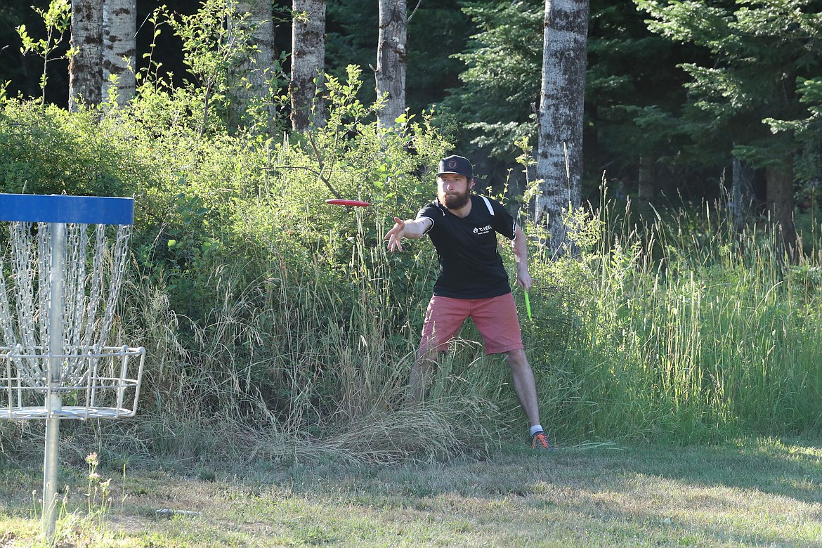 Scenes from Monday's Wampus Park disc golf tourney.