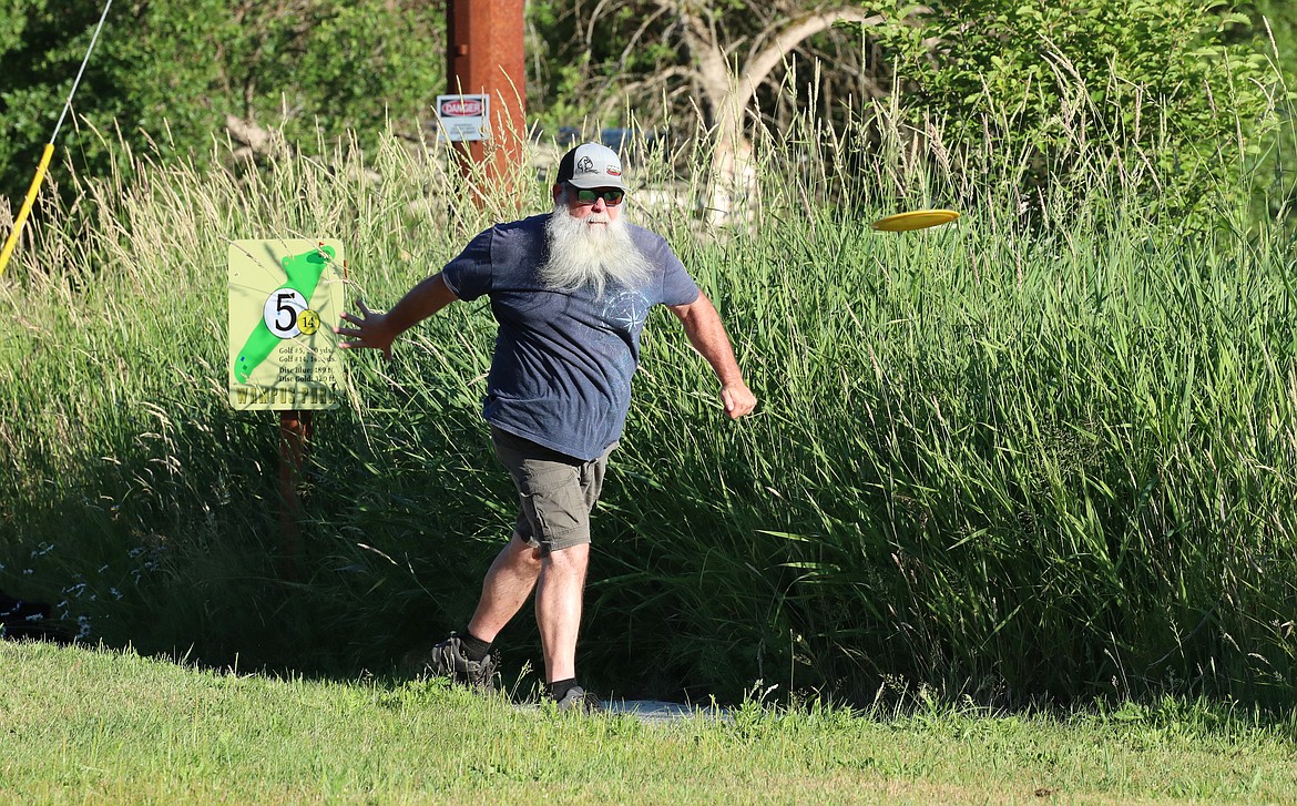 Scenes from Monday's Wampus Park disc golf tourney.