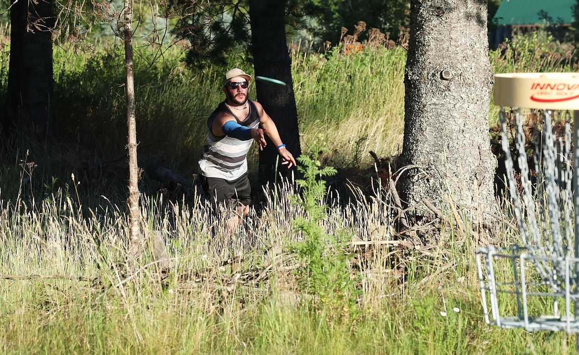 Scenes from Monday's Wampus Park disc golf tourney.