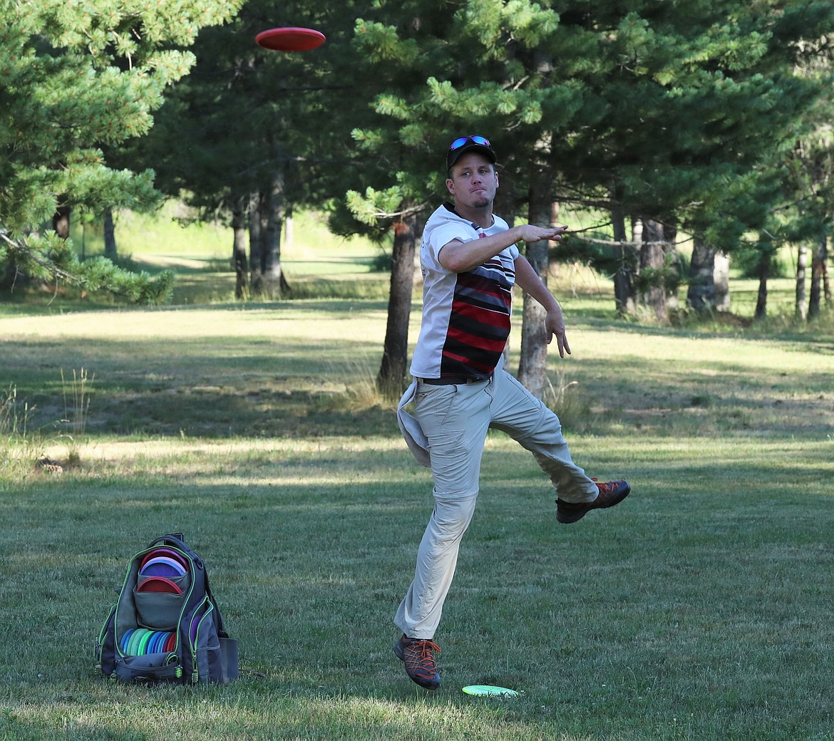 Scenes from Monday's Wampus Park disc golf tourney.