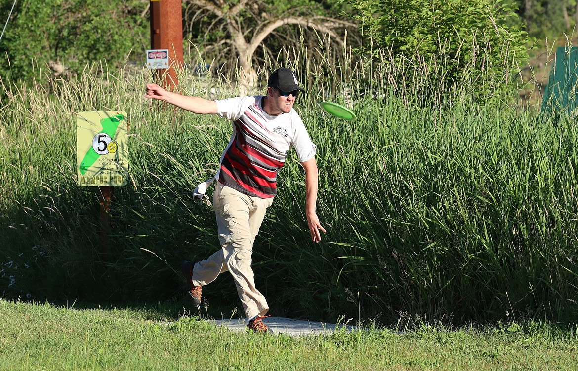 Scenes from Monday's Wampus Park disc golf tourney.