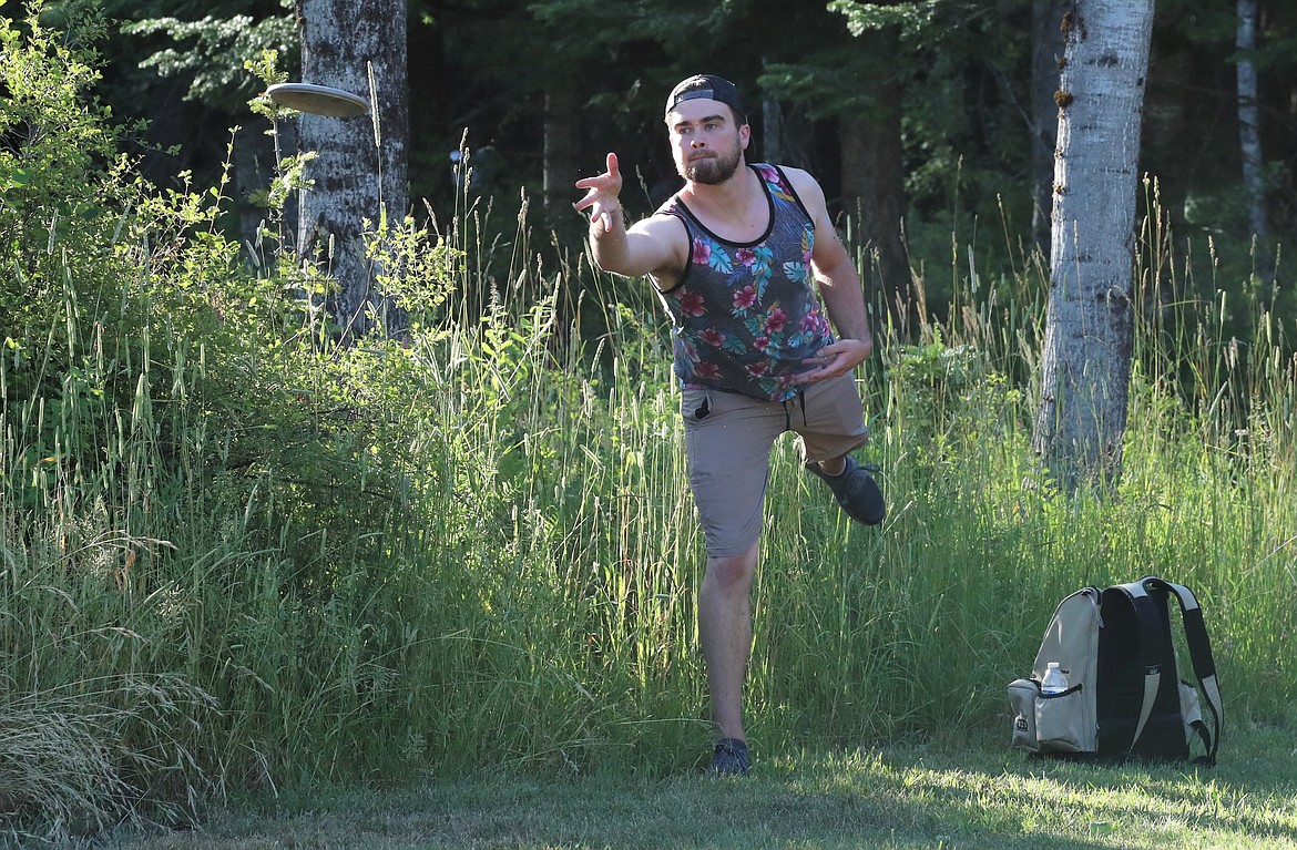 Scenes from Monday's Wampus Park disc golf tourney.