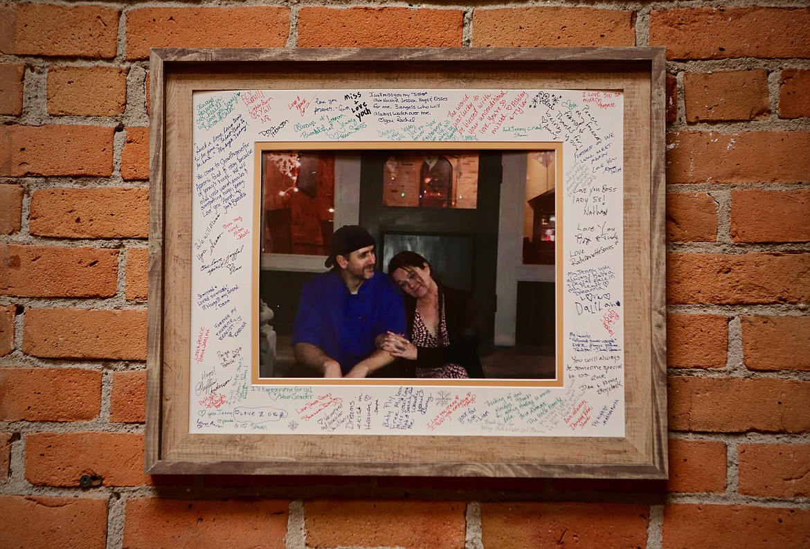 A framed photo inside Showthyme Act II shows owners Aaron Killian and his late wife, Jenny Crough on the front steps of their restaurant on opening night in December 2018.
Mackenzie Reiss/Bigfork Eagle