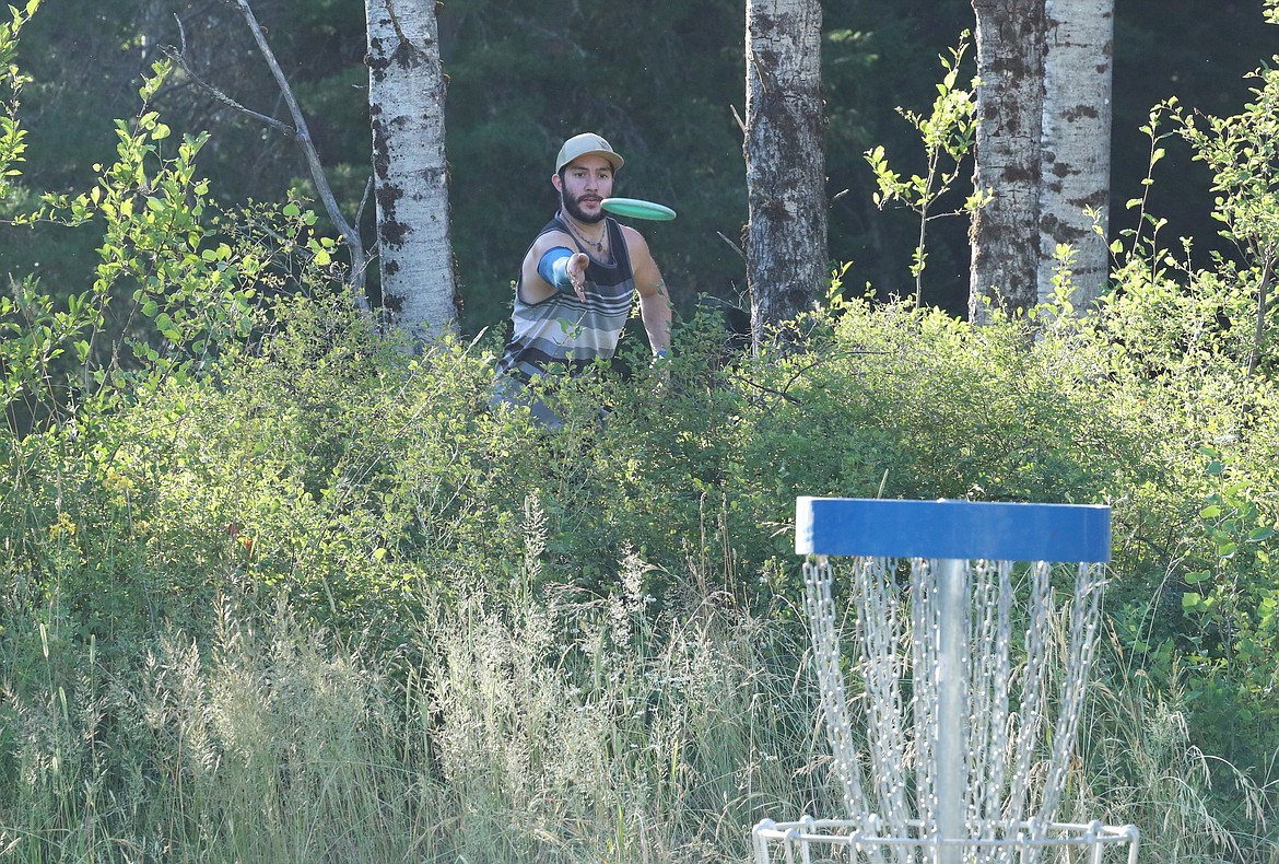 Scenes from Monday's Wampus Park disc golf tourney.