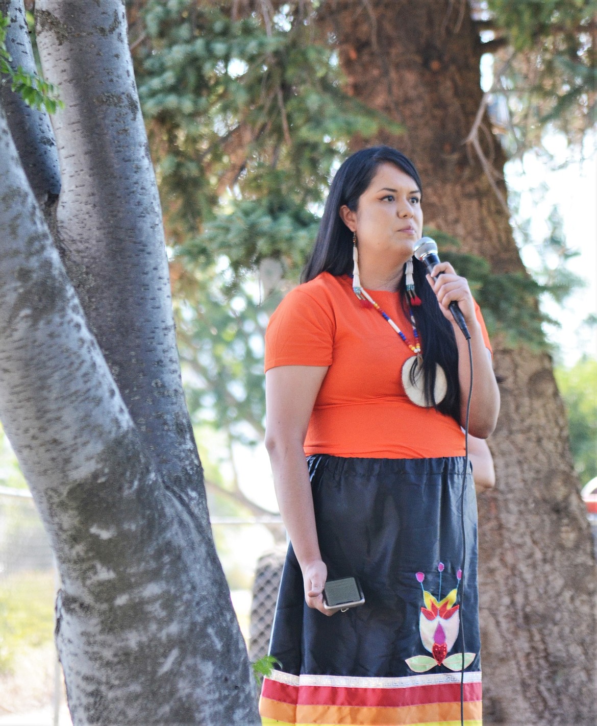 Karissa Trahan-Sorrell read a love letter she wrote to her four children and to “all the children stolen by the boarding schools.” (Carolyn Hidy/Lake County Leader)