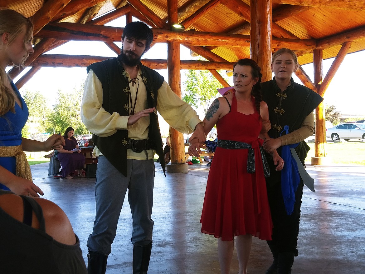 From left, Morgan Hayes, Devin Payne, Shenea Rice and Vivian Grosch portray Helena, Lysander, Hermia and Demetrius in William Shakespeare's "A Midsummer Night's Dream." A production of The Pitiful Players and the Karina Hancock Dancers, the classic was presented at the Fred Brown Pavilion on July 2-3. (Suzanne Resch/The Western News)