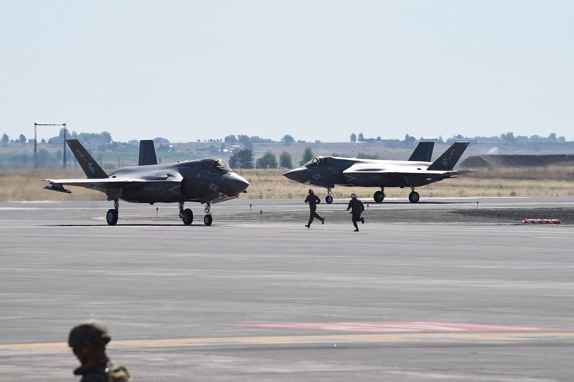 A pair of F-35 Lightning II fighters taxi into position after landing at the Grant County International Airport Thursday as part of a one-day training exercise.
